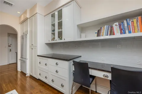 a view of cabinets with wooden floor and cabinet