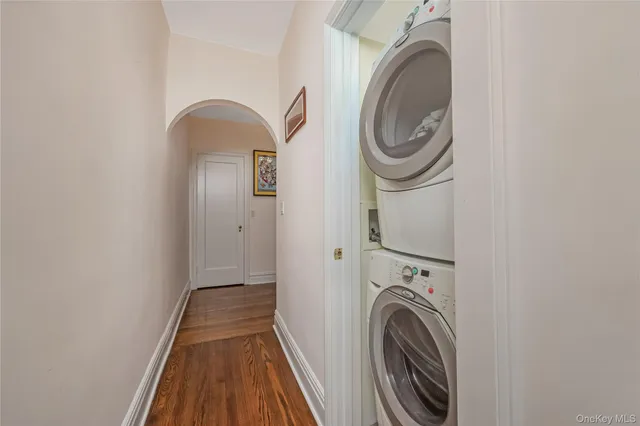 a view of a hallway with washer and dryer