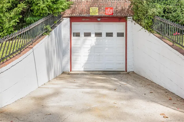 a view of entrance gate with wooden fence