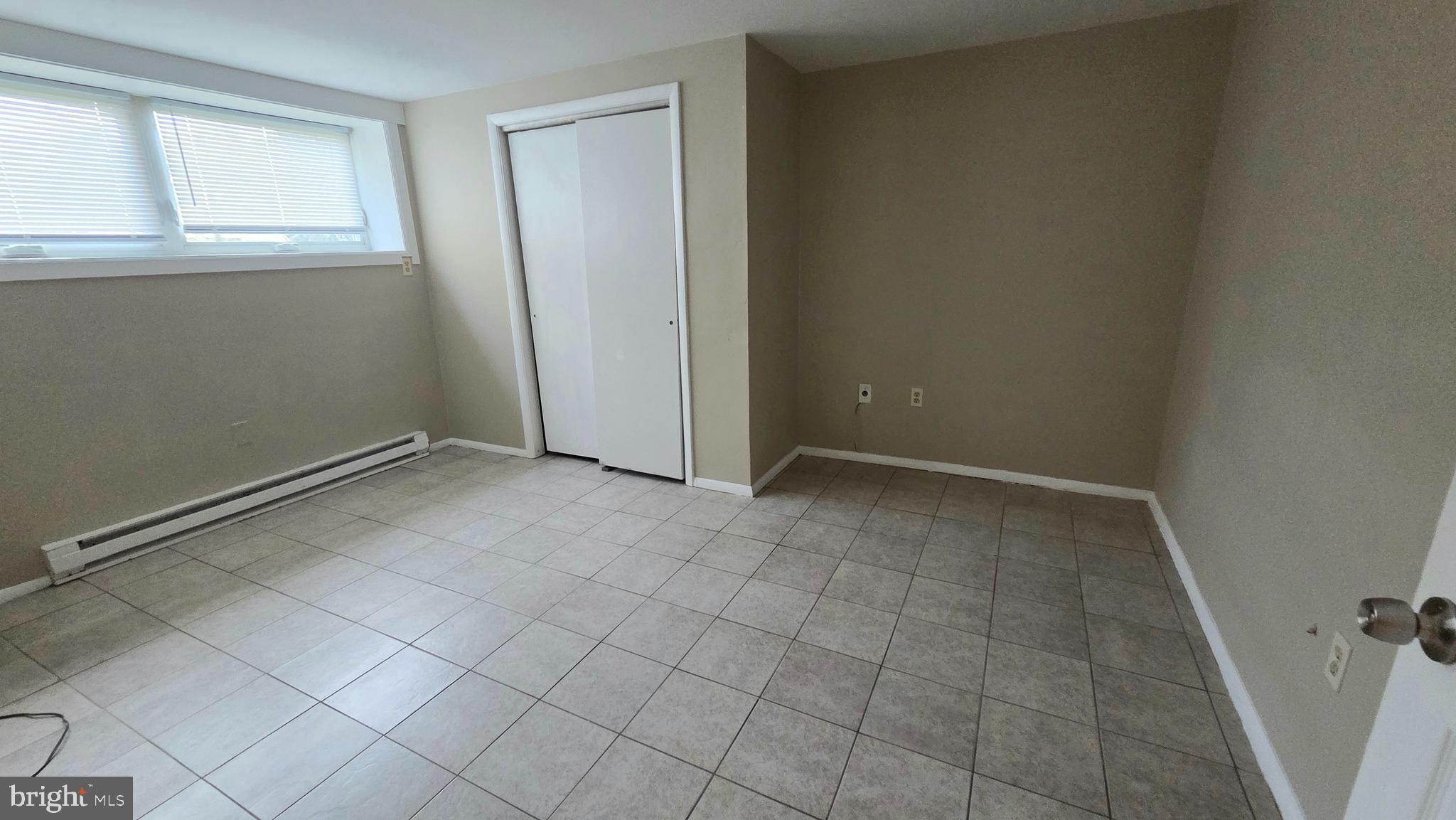 4400 4th Street Baltimore, MD 21225 - Photo 18 of 25 an empty room with windows