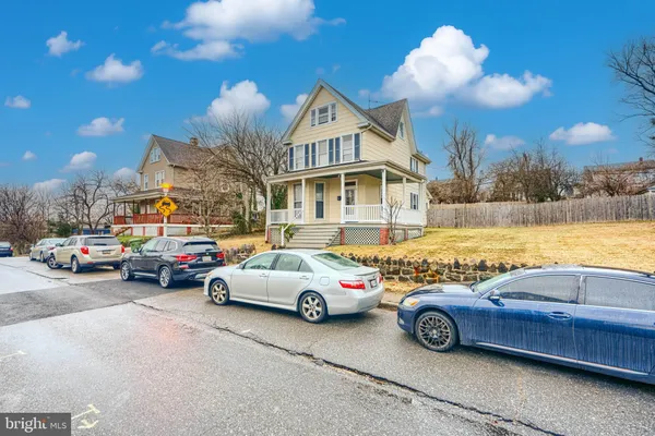 a car parked in front of a house