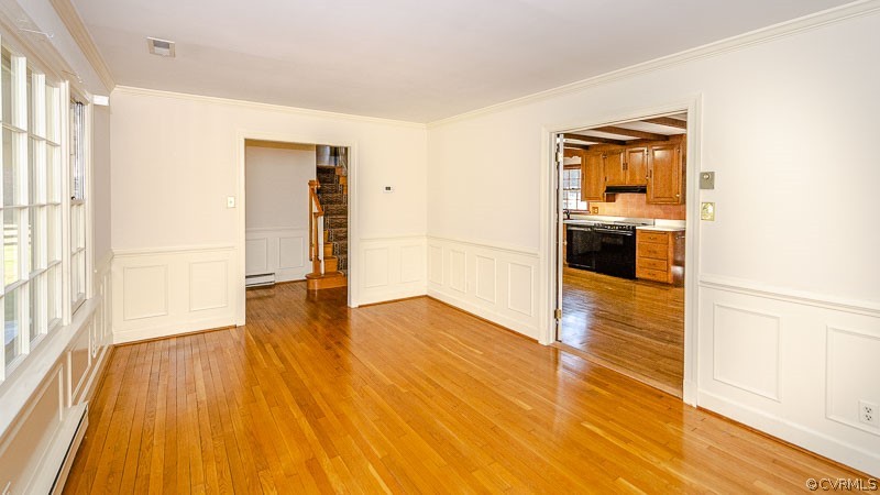 1261 Cardwell Road Crozier, VA 23039 - Photo 8 of 50 a view of empty room with wooden floor and windows
