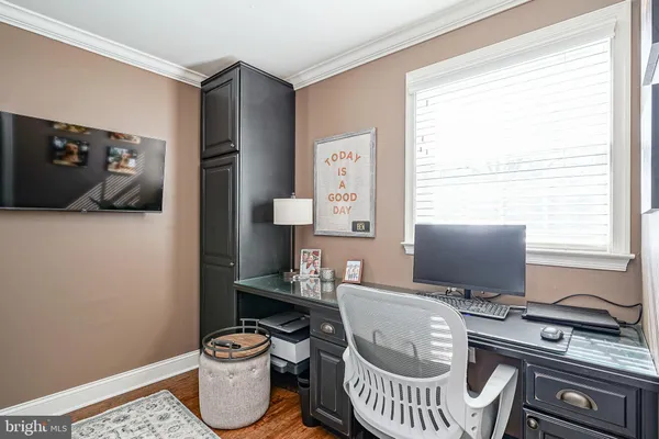 a room with furniture and a window