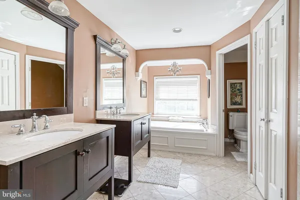 a bathroom with a sink and a bathtub