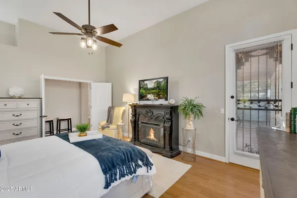 a bathroom with a bathtub sink and a mirror