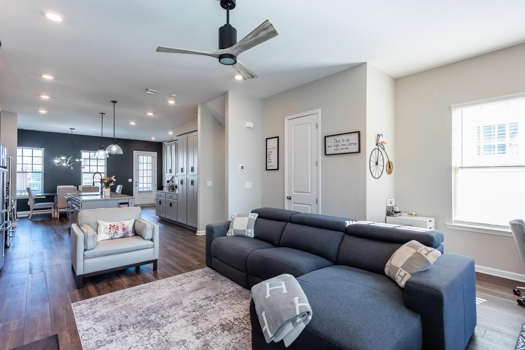 2575 Morehead Street Norcross, GA 30071 - Photo 12 of 36 a living room with furniture and a wooden floor