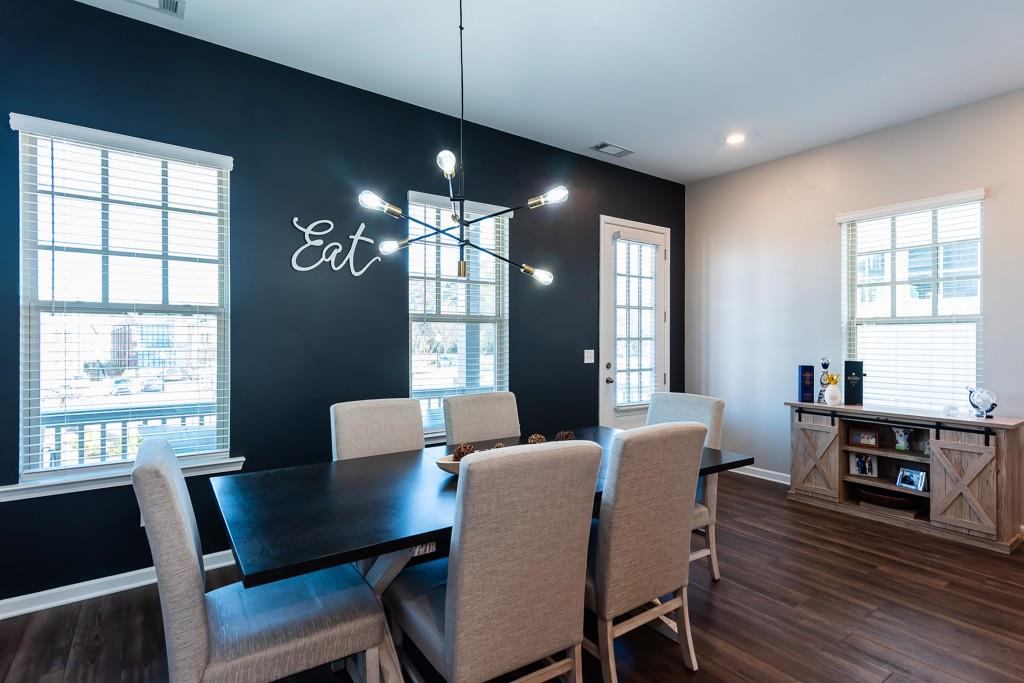 2575 Morehead Street Norcross, GA 30071 - Photo 18 of 36 a view of a dining room with furniture window and wooden floor