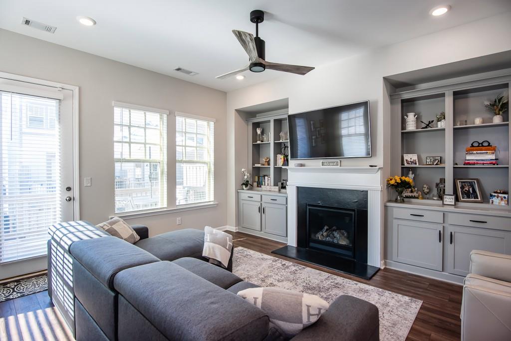 2575 Morehead Street Norcross, GA 30071 - Photo 2 of 36 a living room with furniture fireplace and flat screen tv