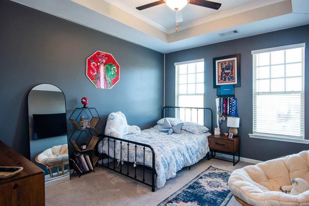 2575 Morehead Street Norcross, GA 30071 - Photo 24 of 36 a bedroom with bed and a window