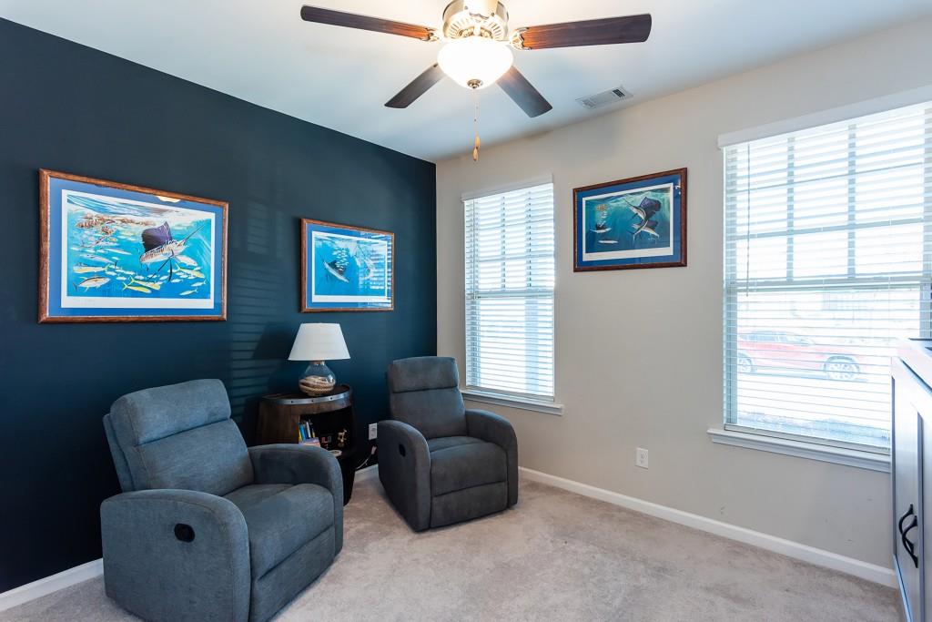 2575 Morehead Street Norcross, GA 30071 - Photo 8 of 36 a living room with furniture and a window
