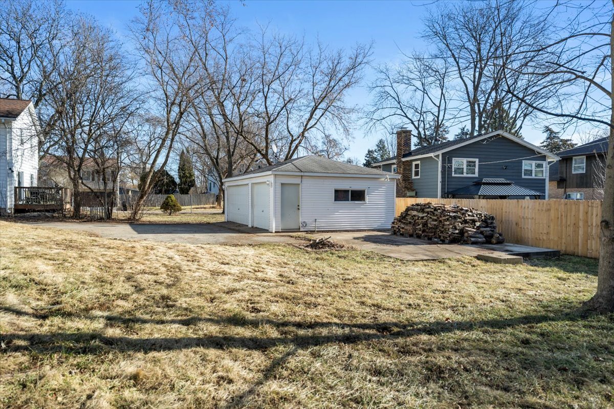 318 East Liberty Street Wauconda, IL 60084 - Photo 25 of 30 a front view of a house with a yard covered with snow