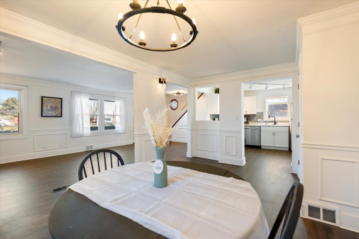 318 East Liberty Street Wauconda, IL 60084 - Photo 4 of 30 a dining room with furniture and wooden floor