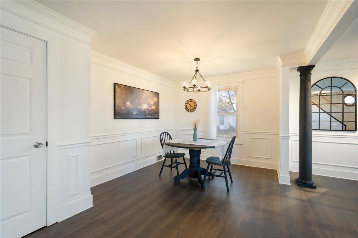 318 East Liberty Street Wauconda, IL 60084 - Photo 7 of 30 a view of a dining room with furniture window and wooden floor