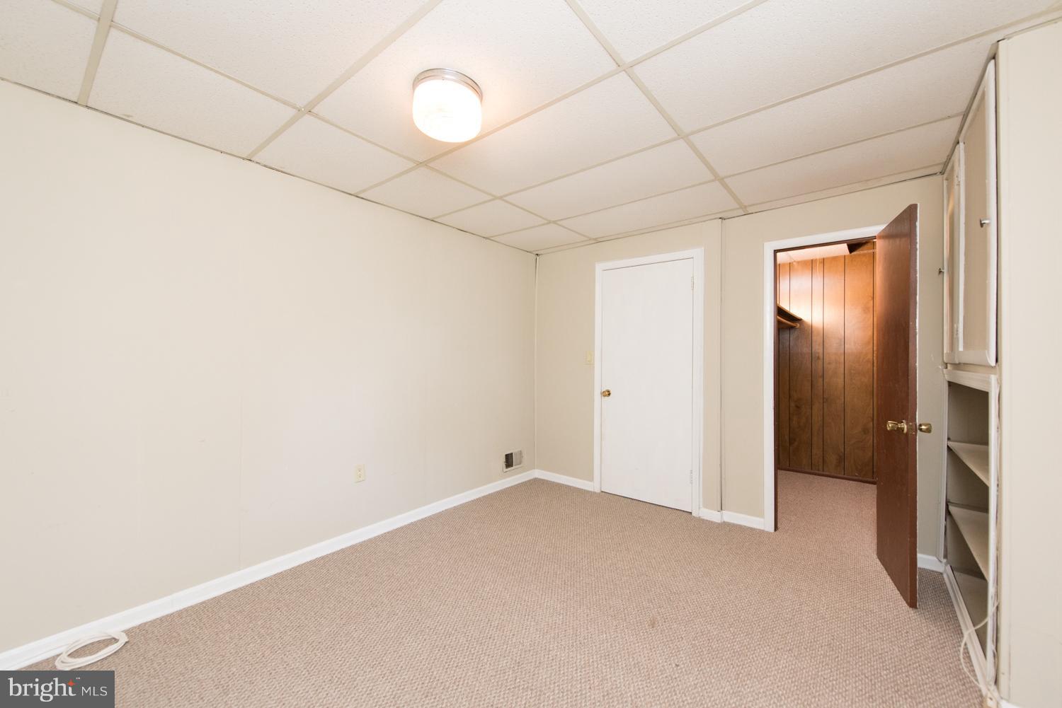 10943 Amherst Avenue Silver Spring, MD 20902 - Photo 16 of 25 12 x 10.5 Fourth Bedroom on Lower Level