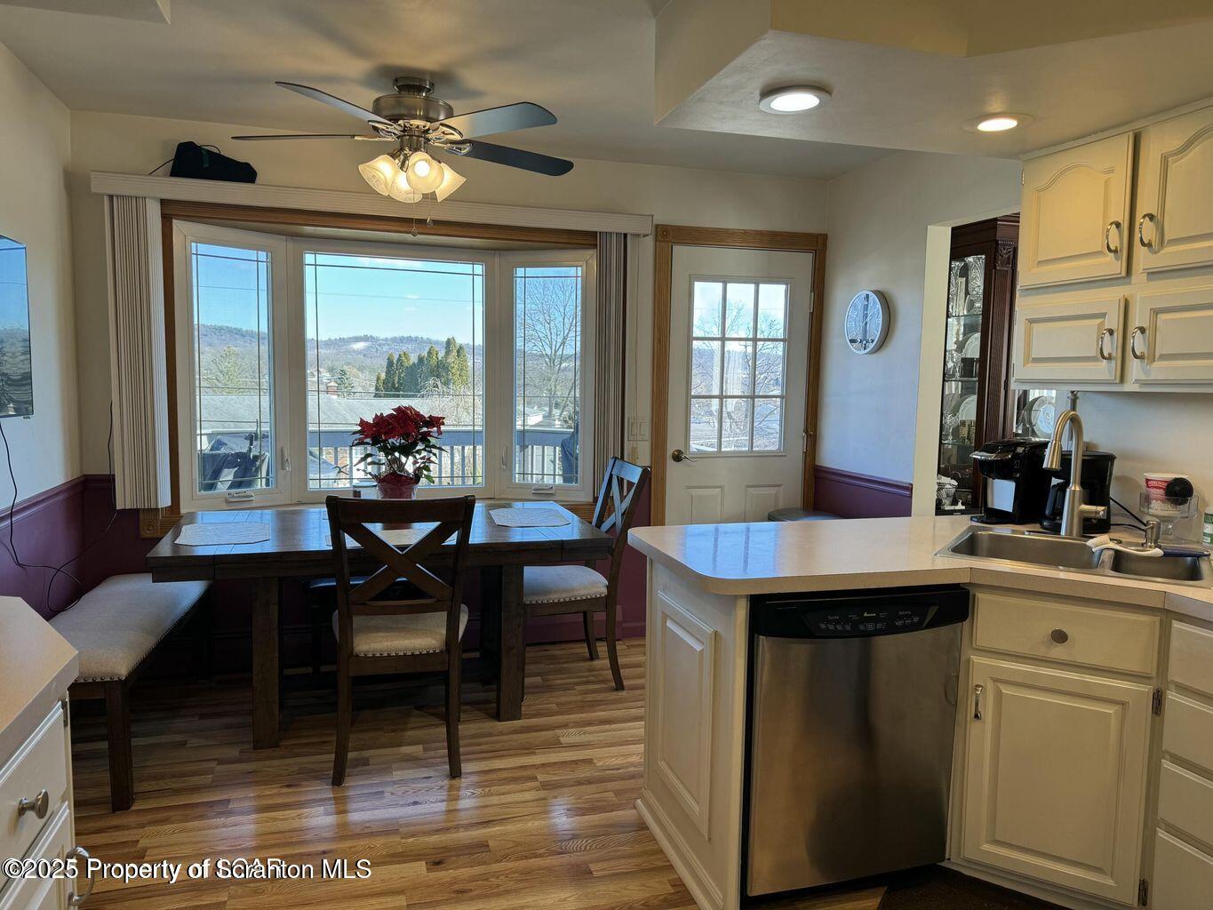 171 Limewood Road Shavertown, PA 18708 - Photo 14 of 41 a living room with furniture a large window and dining table