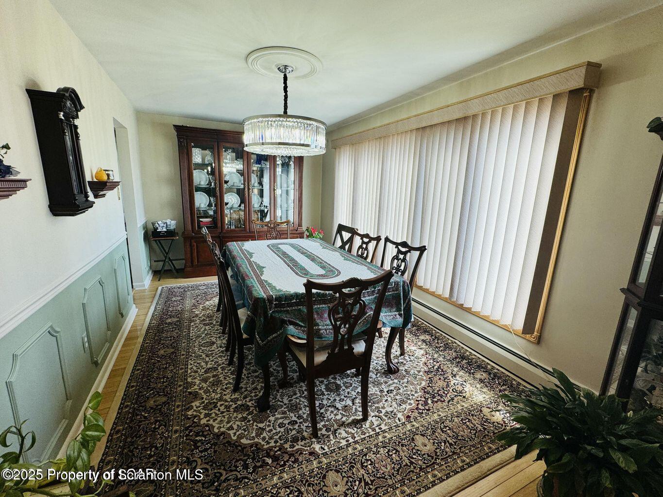 171 Limewood Road Shavertown, PA 18708 - Photo 17 of 41 a view of a dining room with furniture window and wooden floor