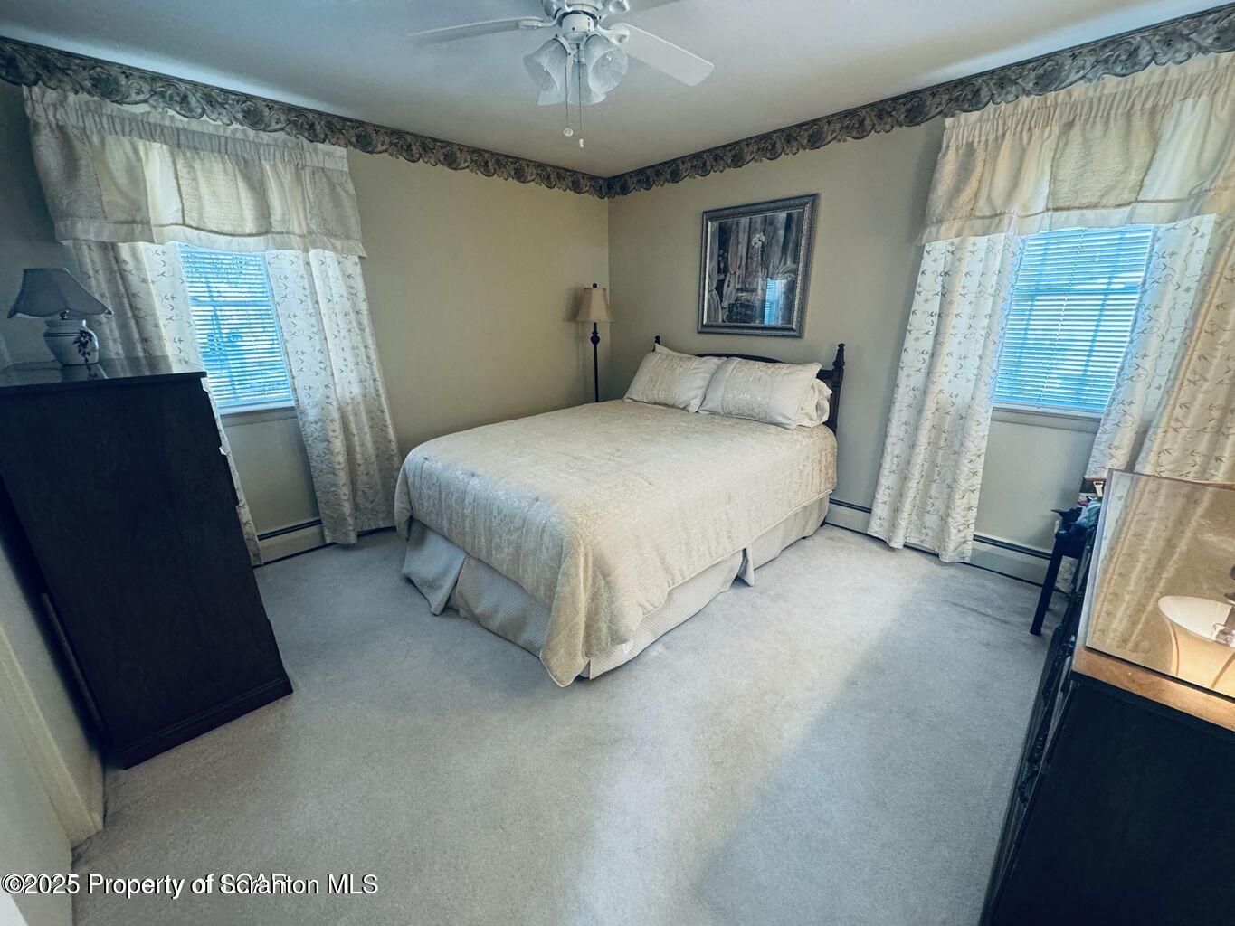 171 Limewood Road Shavertown, PA 18708 - Photo 25 of 41 a bedroom with a bed and a mirror