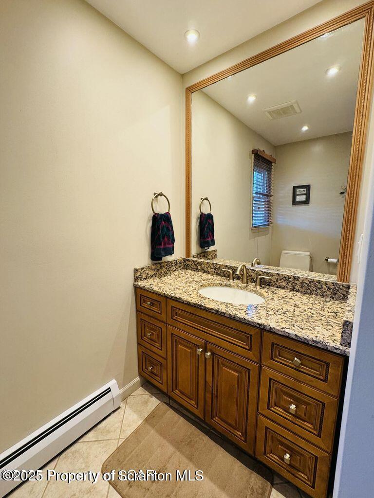 171 Limewood Road Shavertown, PA 18708 - Photo 33 of 41 a bathroom with a granite countertop sink and a mirror