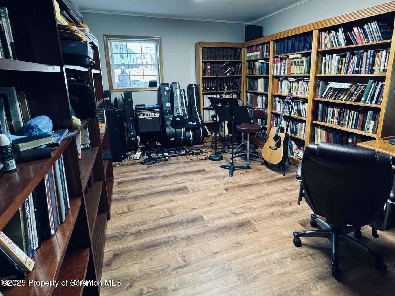 171 Limewood Road Shavertown, PA 18708 - Photo 34 of 41 a view of a workspace with furniture and a bookshelf