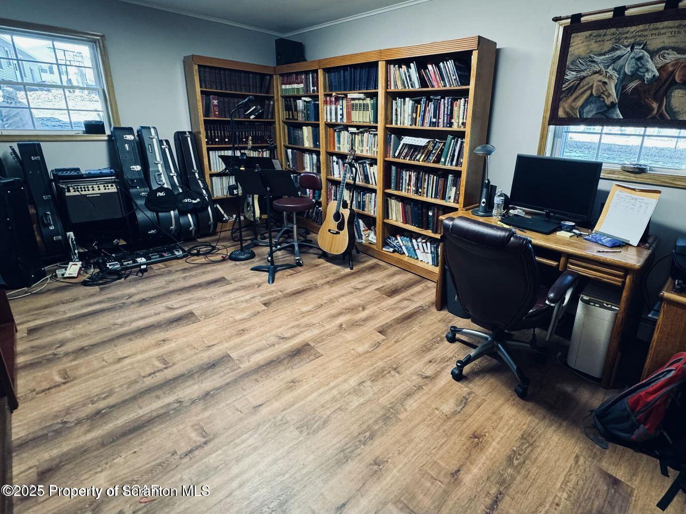 171 Limewood Road Shavertown, PA 18708 - Photo 35 of 41 a view of a workspace with furniture and a bookshelf