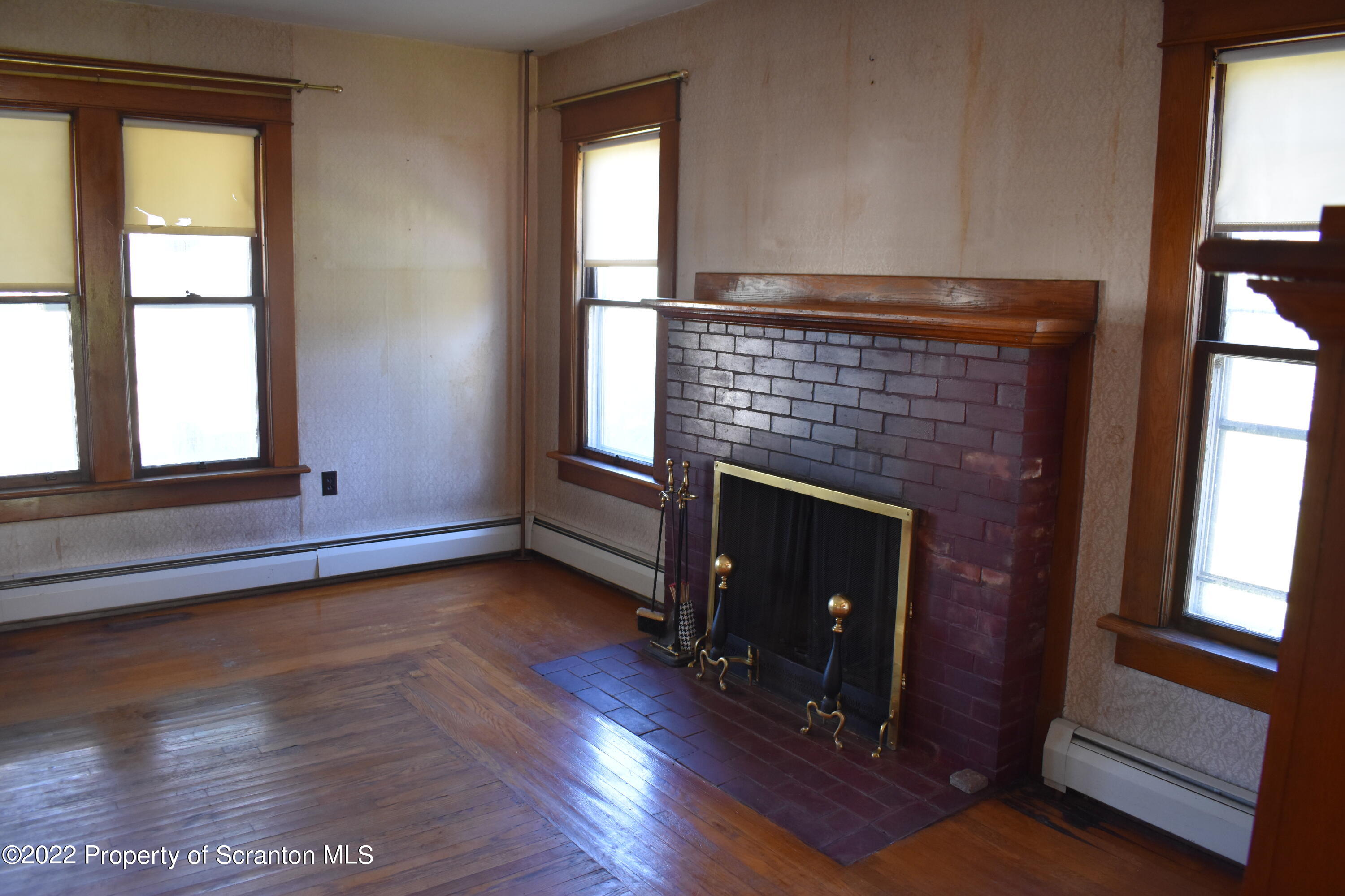 15850 State Rte 3001 Montrose, PA 18801 - Photo 13 of 66 a view of an empty room with wooden floor and a window