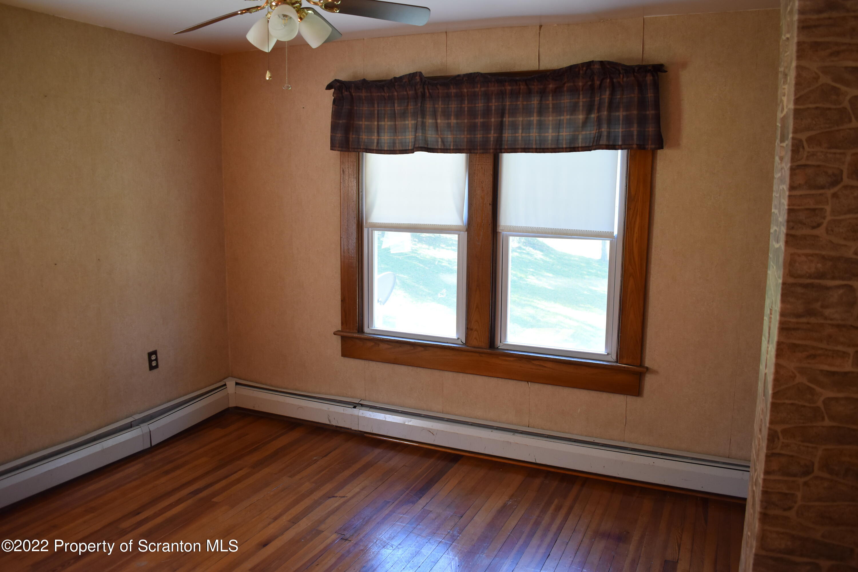 15850 State Rte 3001 Montrose, PA 18801 - Photo 21 of 66 an empty room with wooden floor and windows