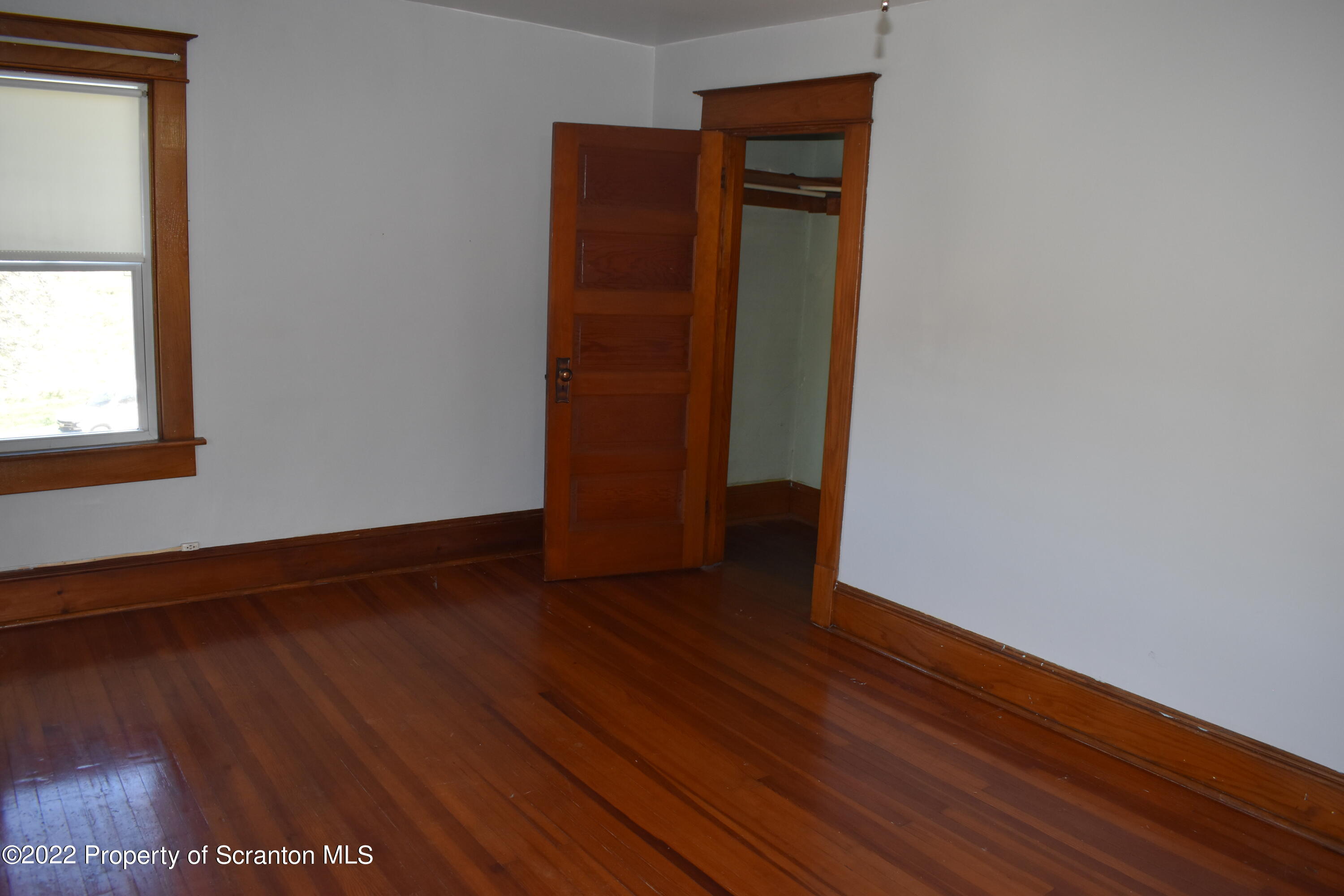 15850 State Rte 3001 Montrose, PA 18801 - Photo 31 of 66 a view of an empty room with wooden floor and a window