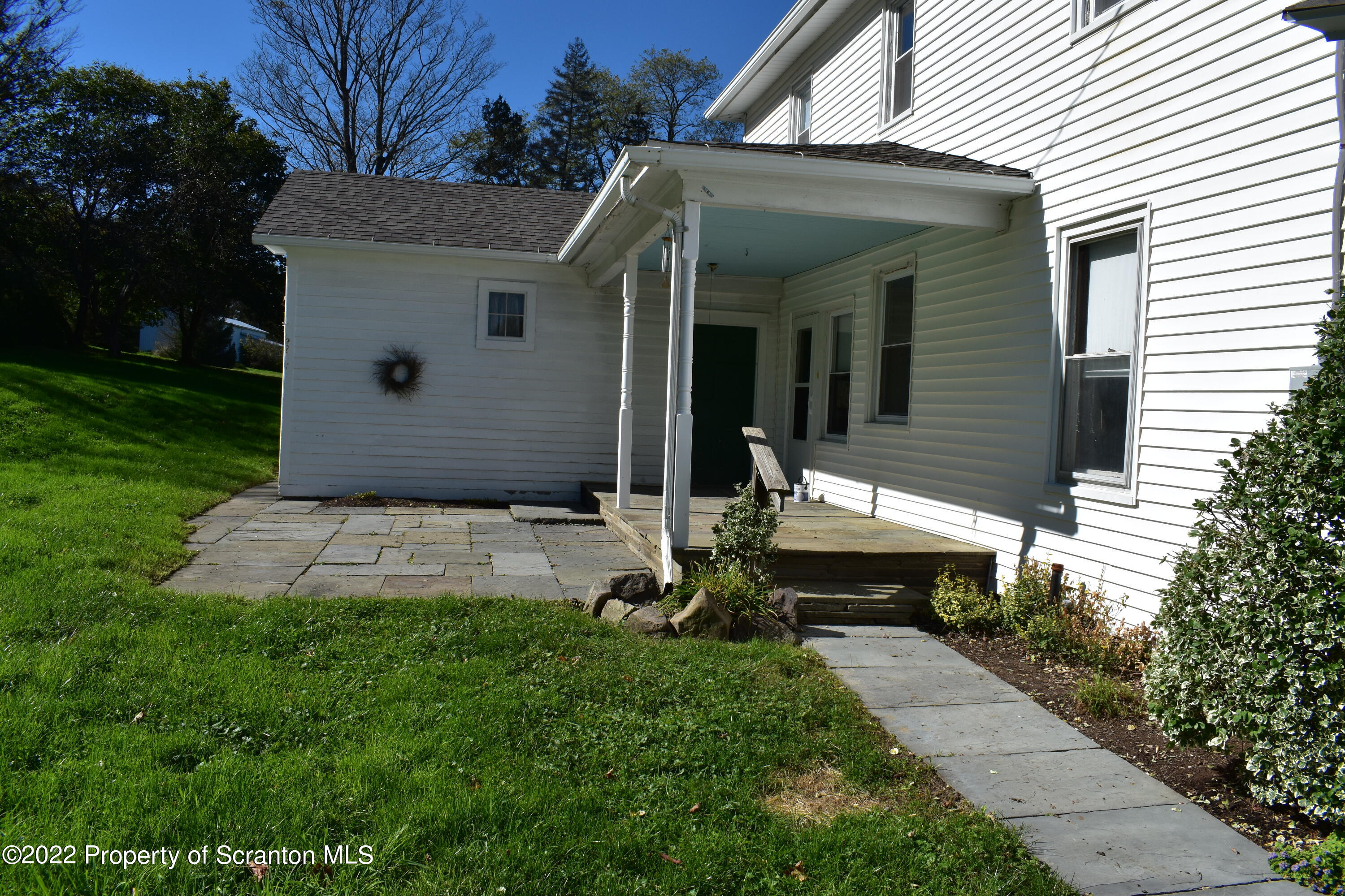 15850 State Rte 3001 Montrose, PA 18801 - Photo 35 of 66 a front view of a house with garden