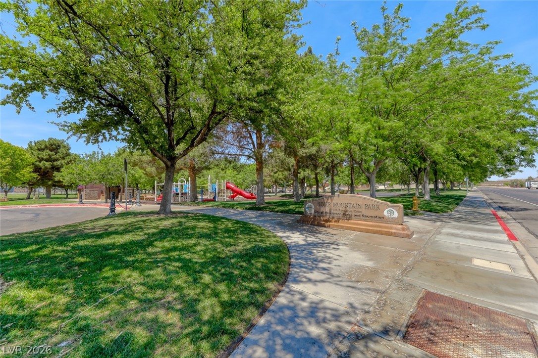 2001 Appaloosa Road Henderson, NV 89002 - Photo 11 of 44 Lush parkland offers a serene setting with a dedicated children's play area and ample green space.