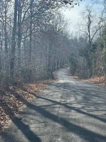 a view of empty room with trees