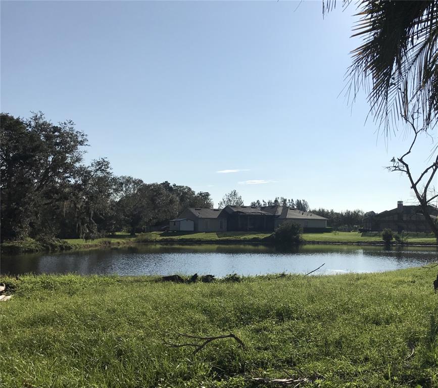 1001 Aultman Road Kissimmee, FL 34744 - Photo 16 of 17 a view of a lake with houses in background