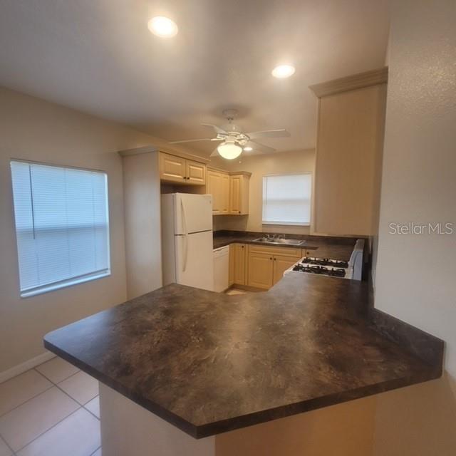 1001 Aultman Road Kissimmee, FL 34744 - Photo 3 of 17 a view of kitchen and a window