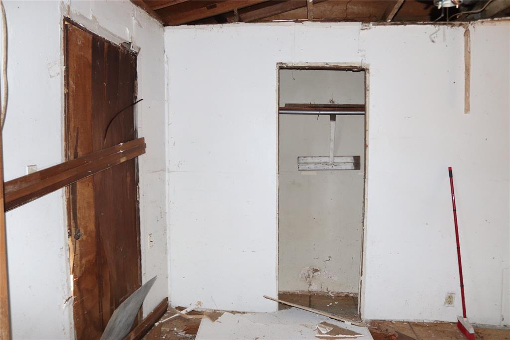 417 North Scullin Avenue Denison, TX 75020 - Photo 4 of 16 a room with storage and utility