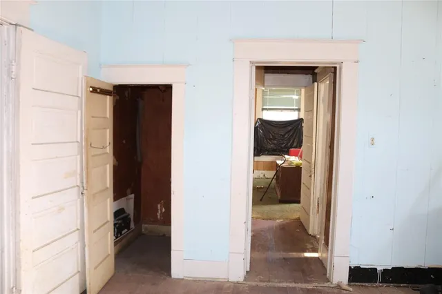 a view of a bathroom from a hallway