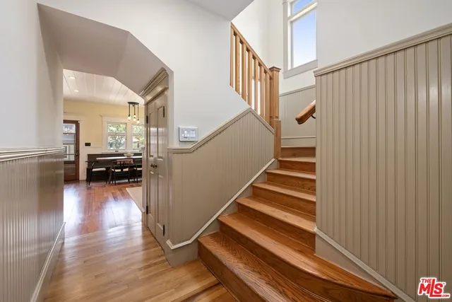 a bathroom with a shower and a bath tub