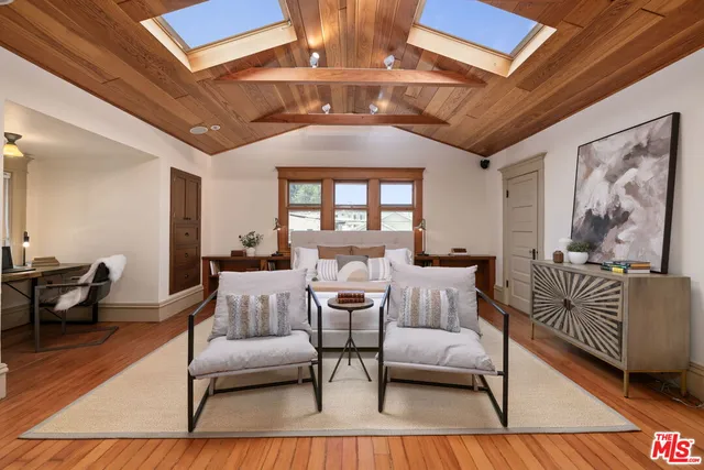 a bed room with a bed and a couch