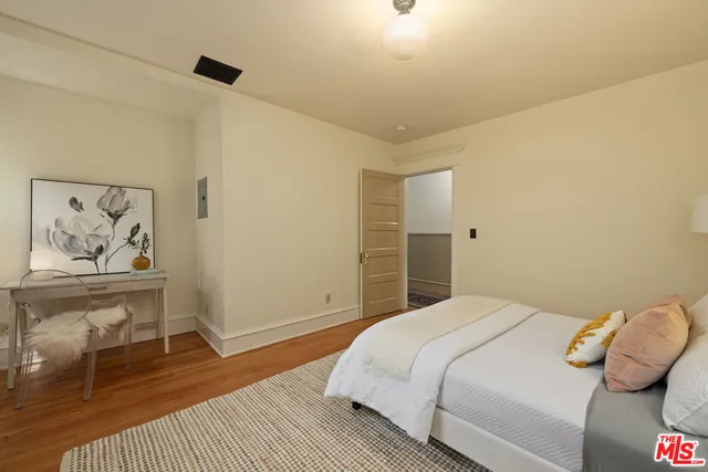 a view of a chairs and table in the patio