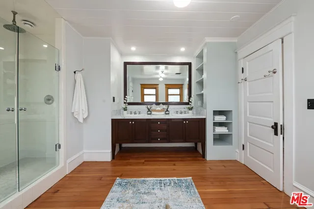 a view of a field with an ocean view