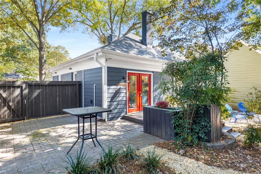 216 Haralson Avenue Northeast Atlanta, GA 30307 - Photo 28 of 34 a front view of a house with garden