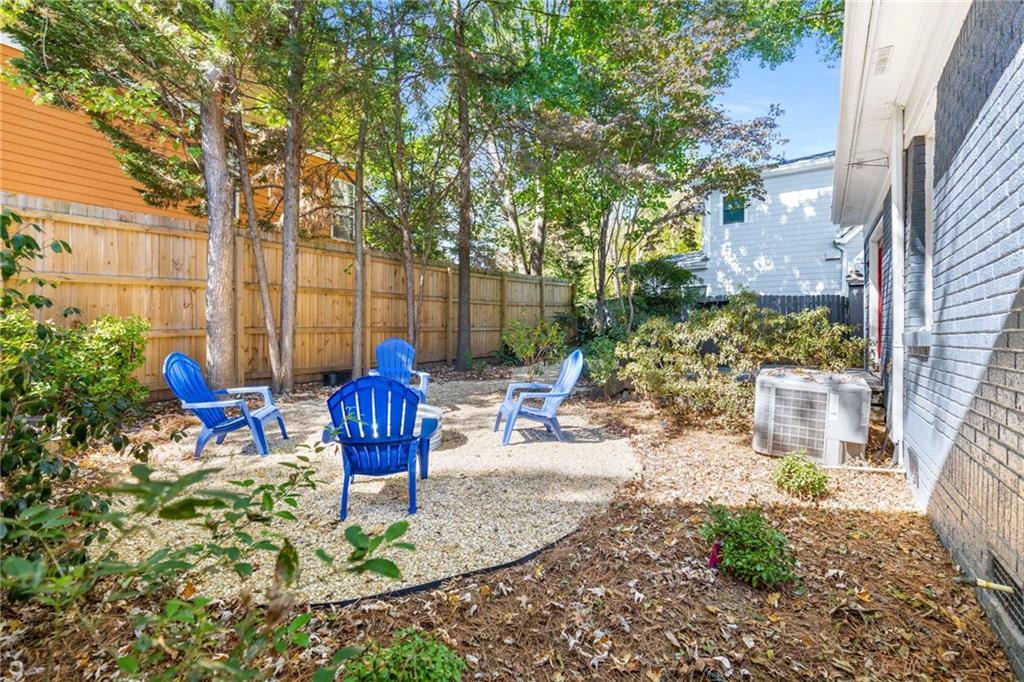 216 Haralson Avenue Northeast Atlanta, GA 30307 - Photo 32 of 34 a view of a chairs and table in backyard