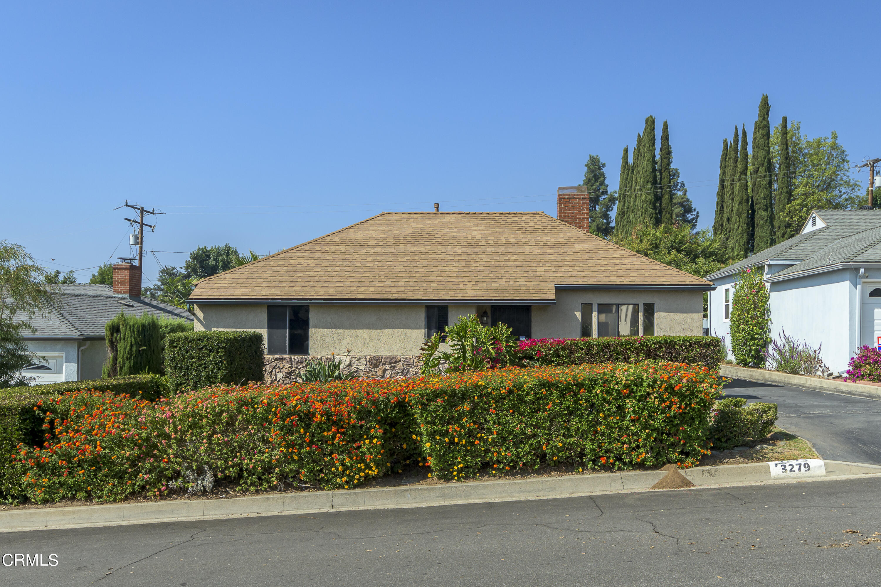 3279 Laurice Avenue Altadena, CA 91001 - Photo 1 of 24 a front view of a house with a garden
