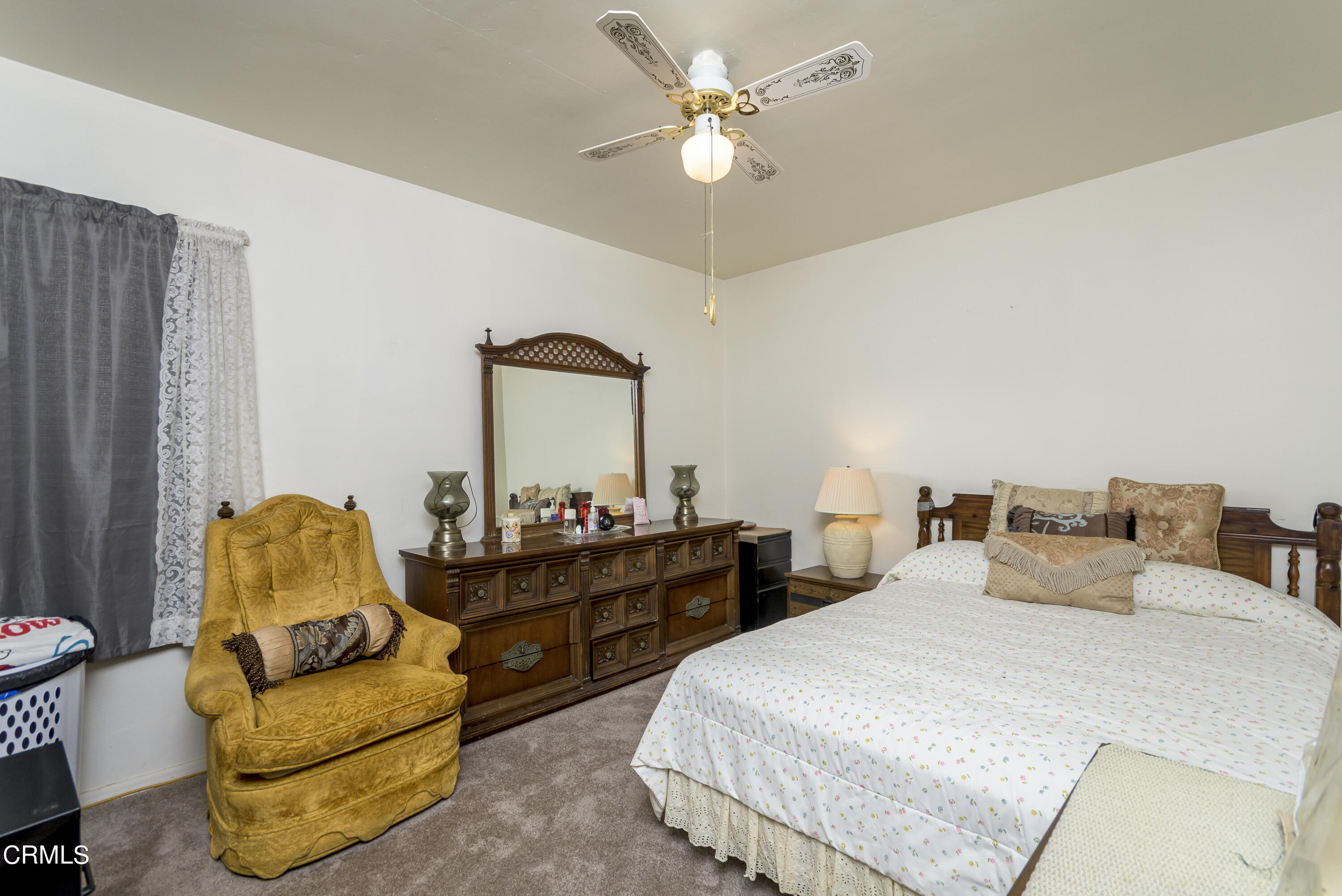 3279 Laurice Avenue Altadena, CA 91001 - Photo 14 of 24 a bedroom with furniture and a large mirror