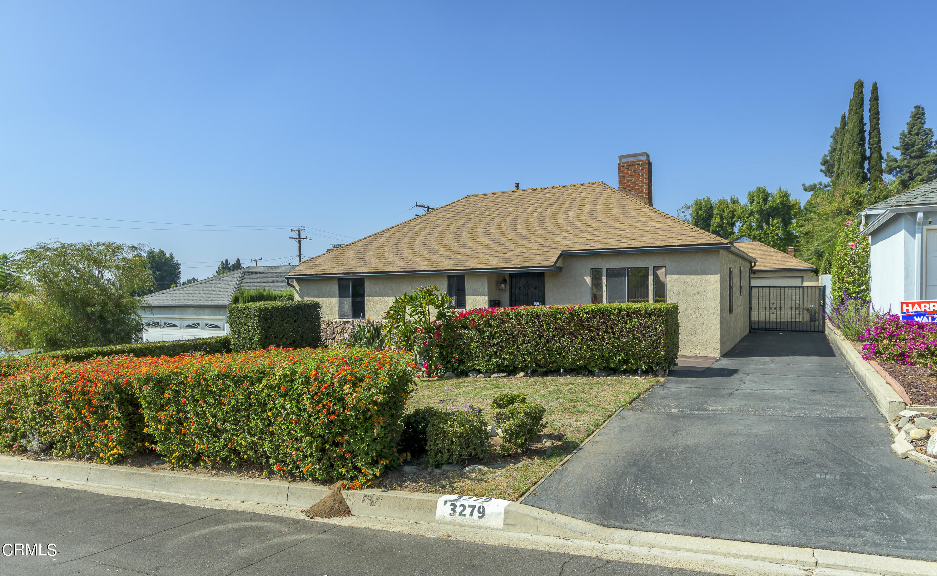 3279 Laurice Avenue Altadena, CA 91001 - Photo 2 of 24 a front view of a house with a yard