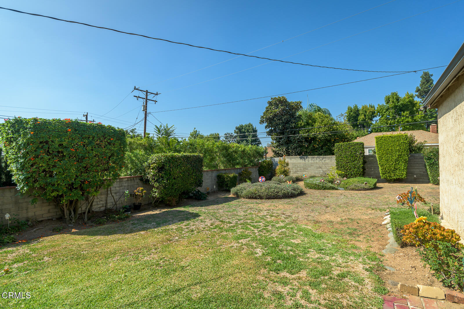 3279 Laurice Avenue Altadena, CA 91001 - Photo 21 of 24 a view of a backyard with potted plants