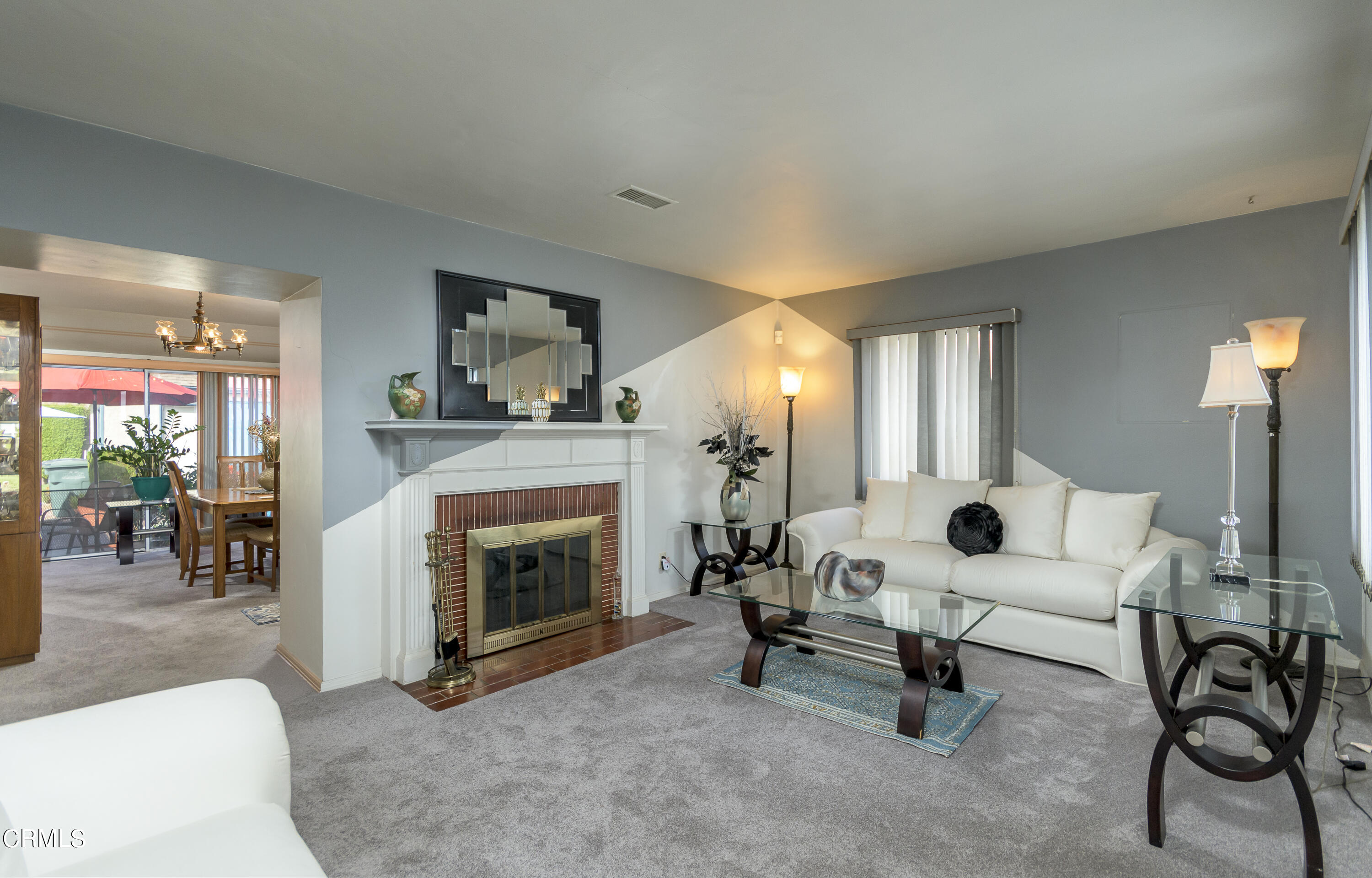 3279 Laurice Avenue Altadena, CA 91001 - Photo 4 of 24 a living room with furniture and a fireplace