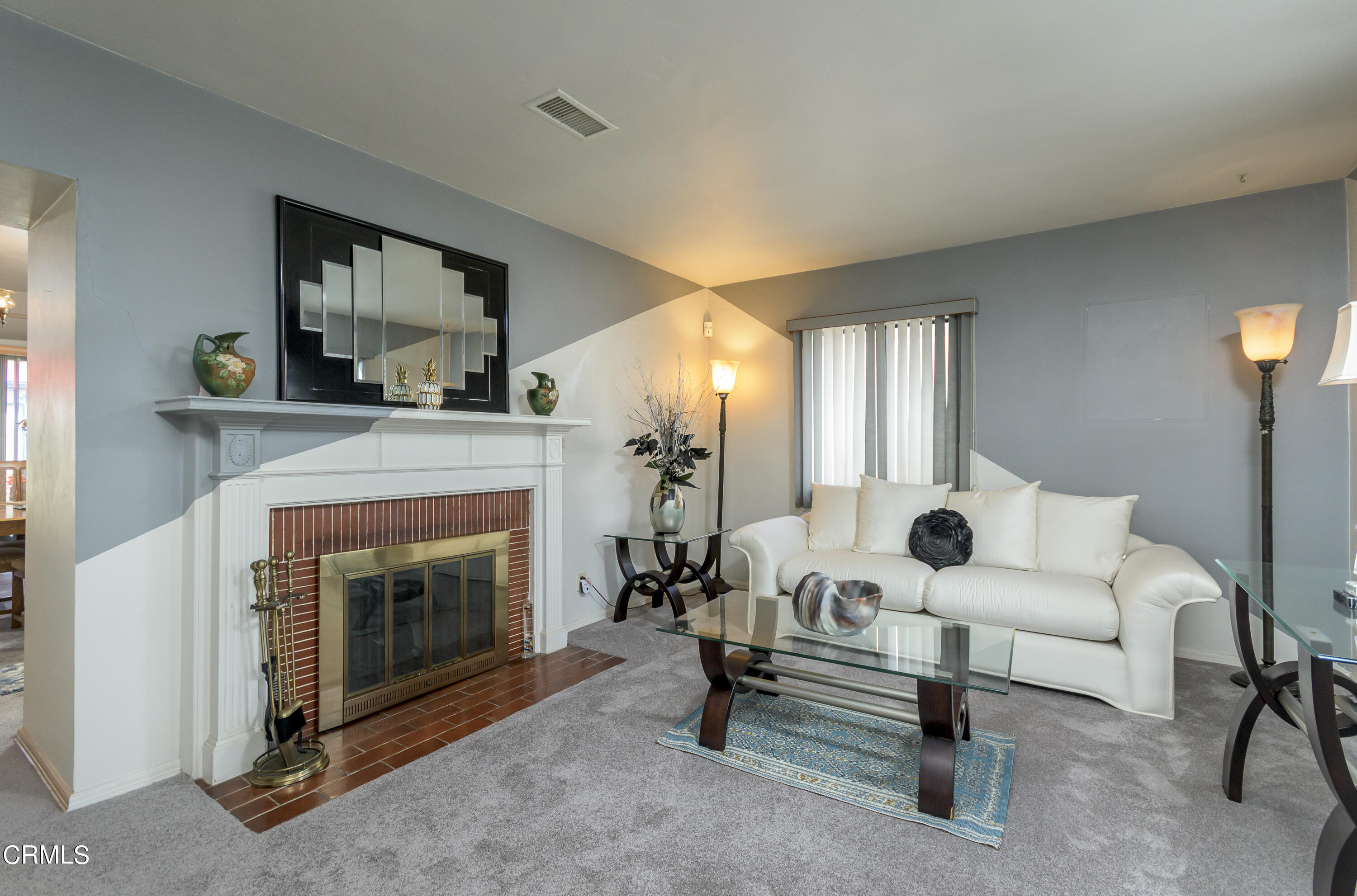3279 Laurice Avenue Altadena, CA 91001 - Photo 5 of 24 a living room with furniture and a fireplace