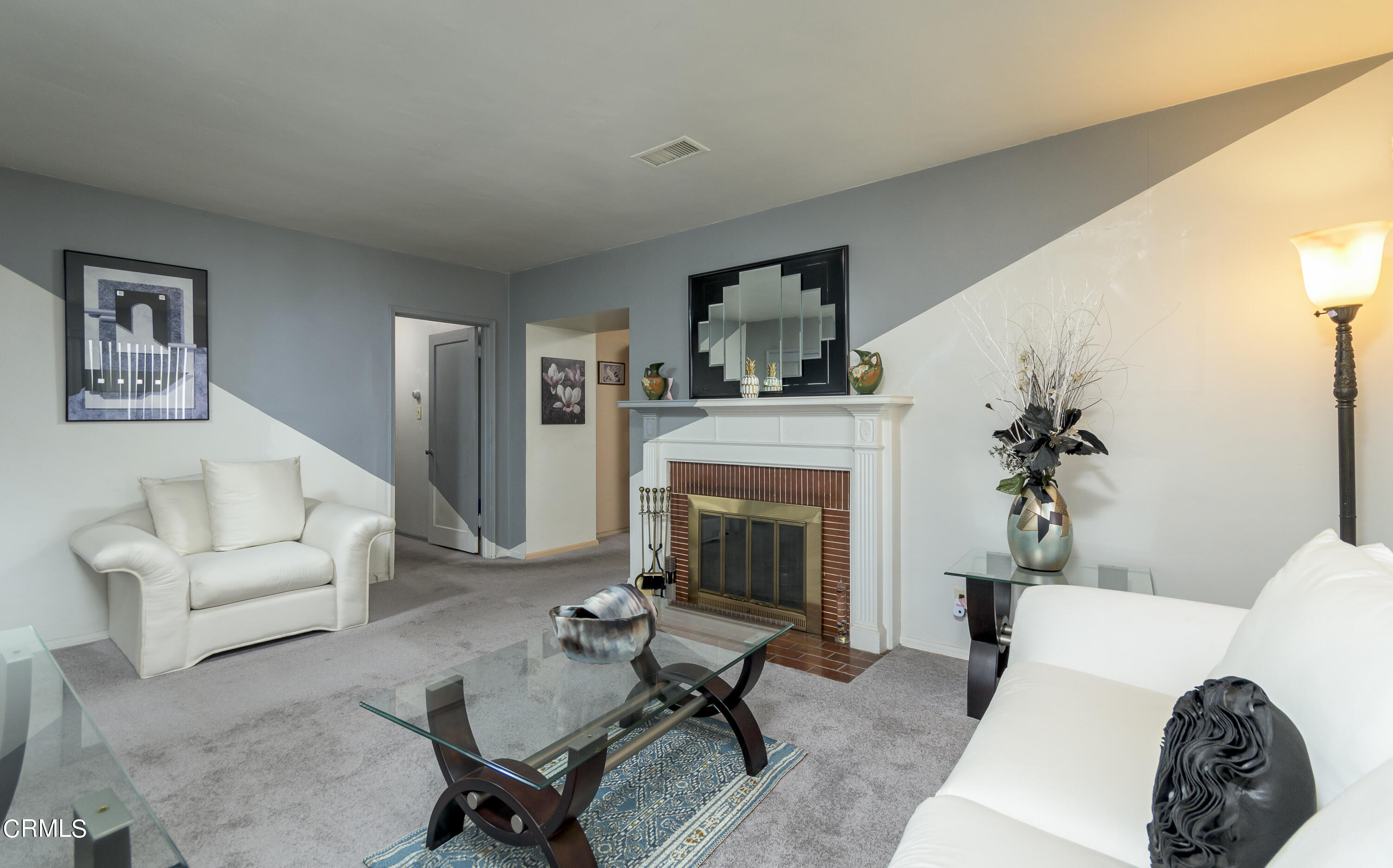 3279 Laurice Avenue Altadena, CA 91001 - Photo 6 of 24 a living room with furniture and a fireplace