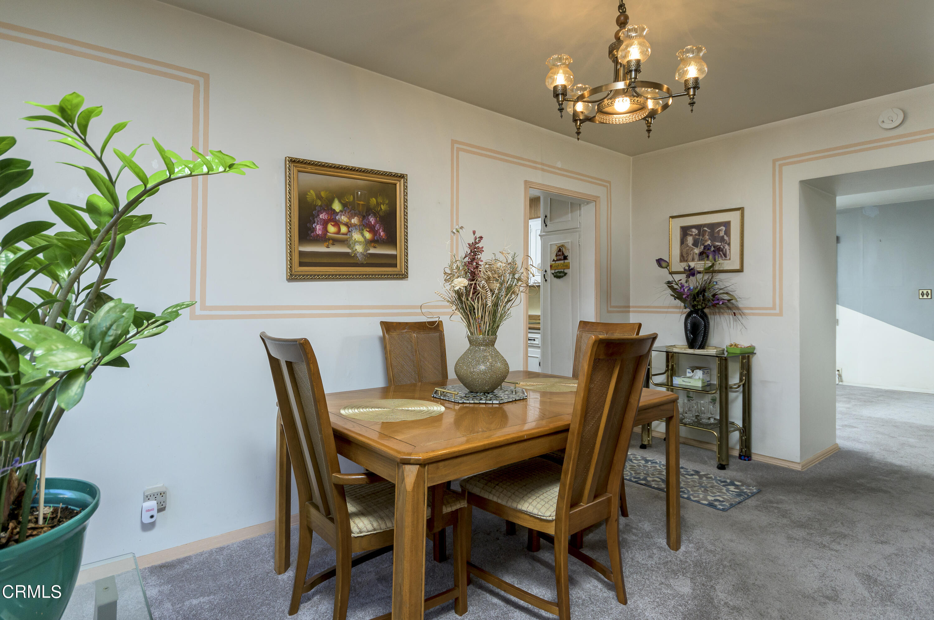 3279 Laurice Avenue Altadena, CA 91001 - Photo 7 of 24 a view of a dining room with furniture and chandelier
