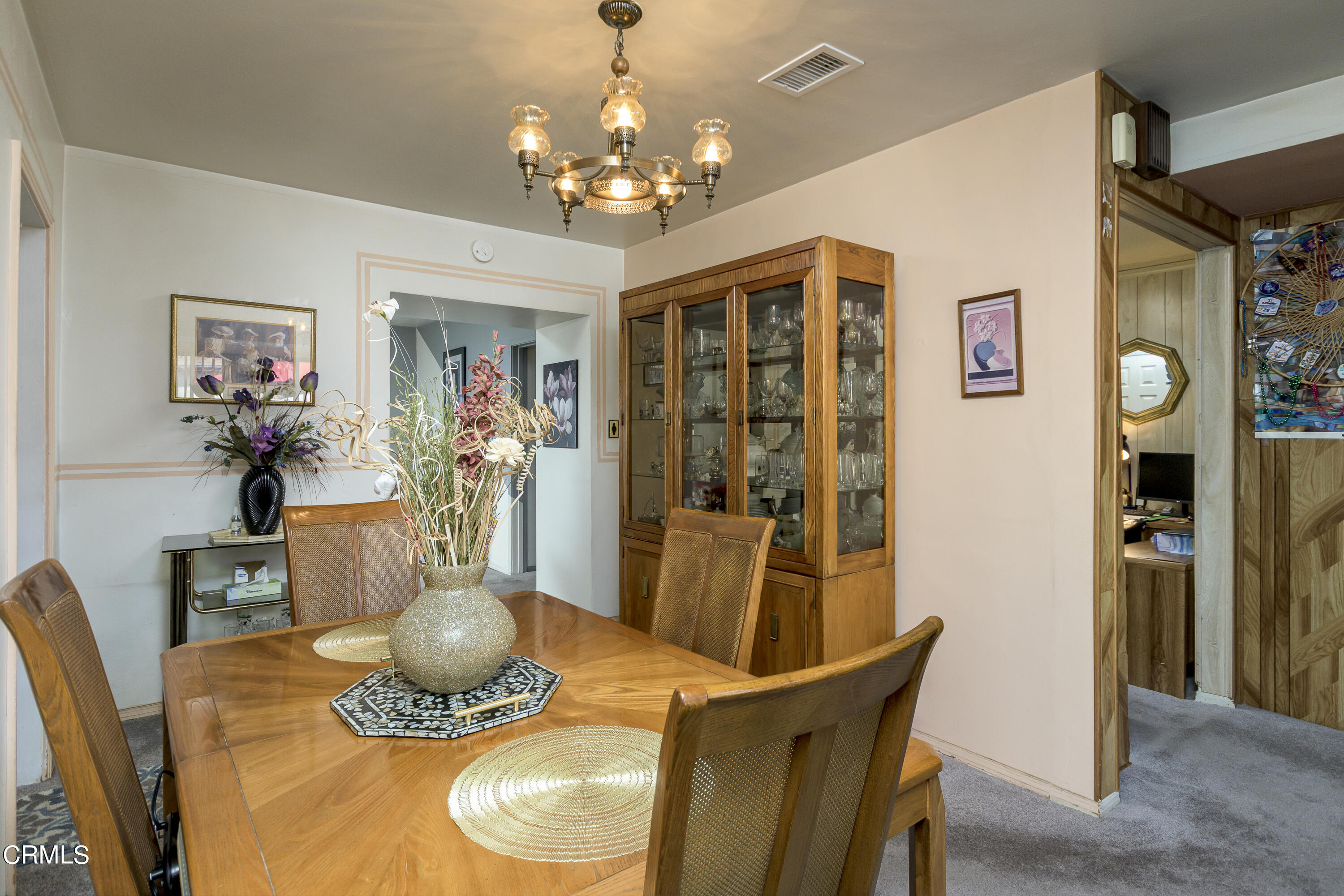 3279 Laurice Avenue Altadena, CA 91001 - Photo 8 of 24 a dining room with furniture and chandelier