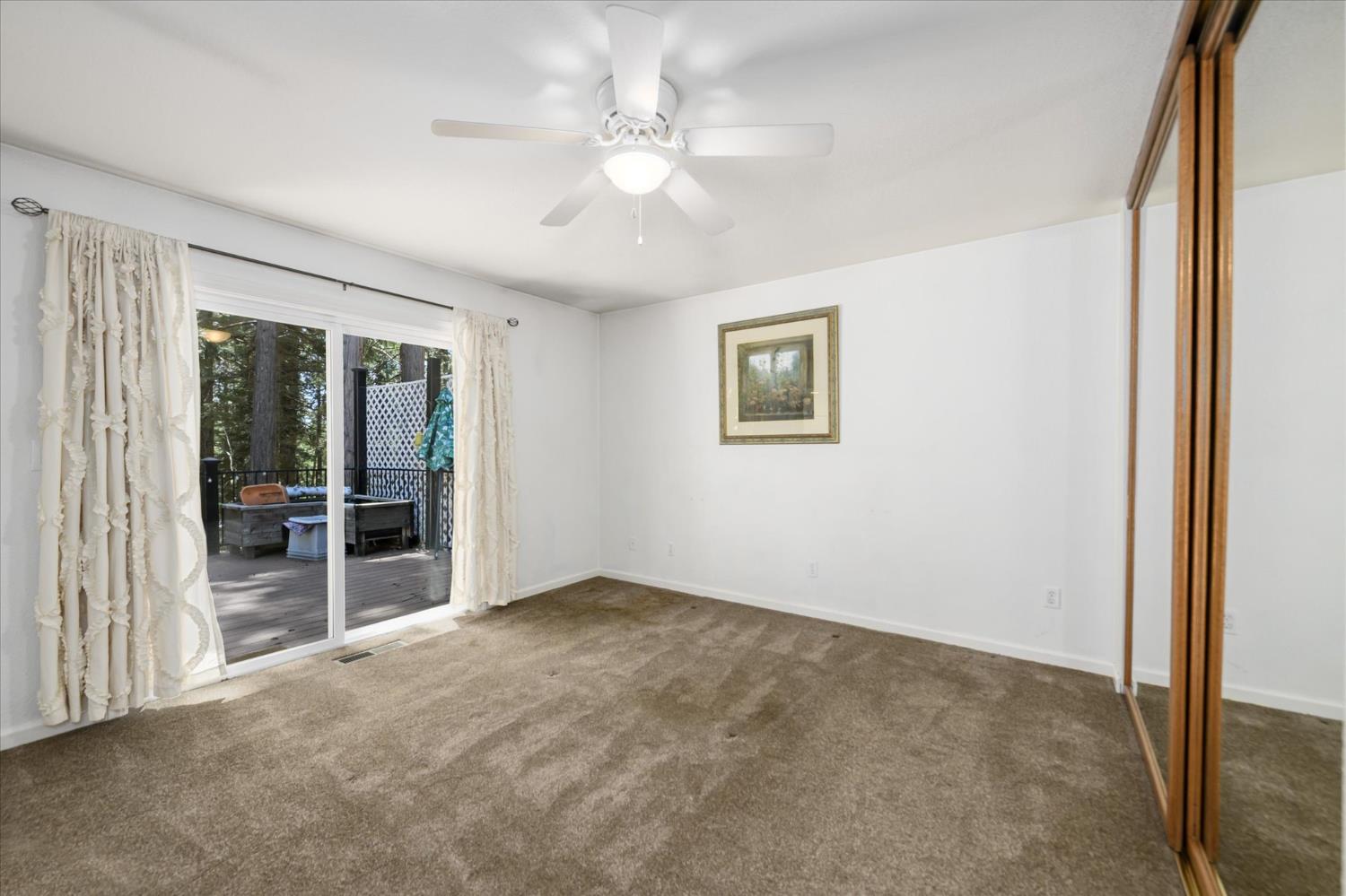 6480 Granite Trail Pollock Pines, CA 95726 - Photo 12 of 23 an empty room with windows and closet